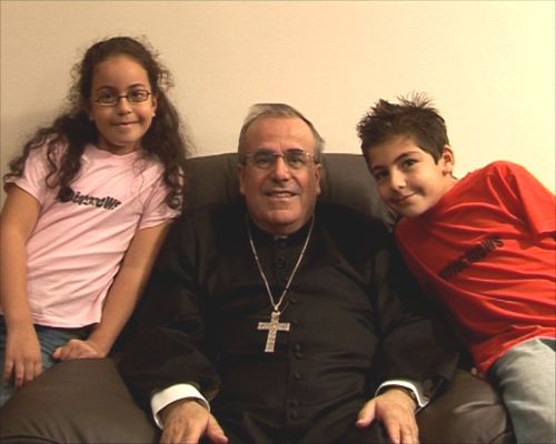 Archbishop Pawl Cremona with children