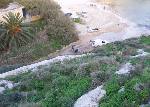 Cement mixers at work on Mgarr ix-Xini beach Cement mixers at work on Mgarr ix-Xini beach