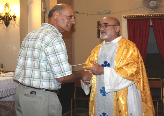 Padre Pio Prayer Groups collect donation for Mission