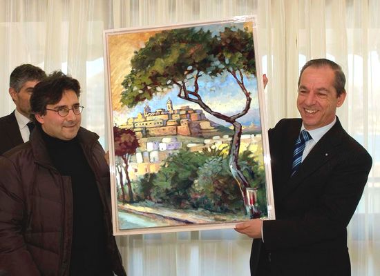 George Scicluna presents painting to the Prime Minister