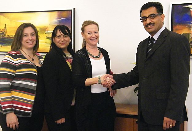 Staff at FIMBank show their support for Butterfly Children