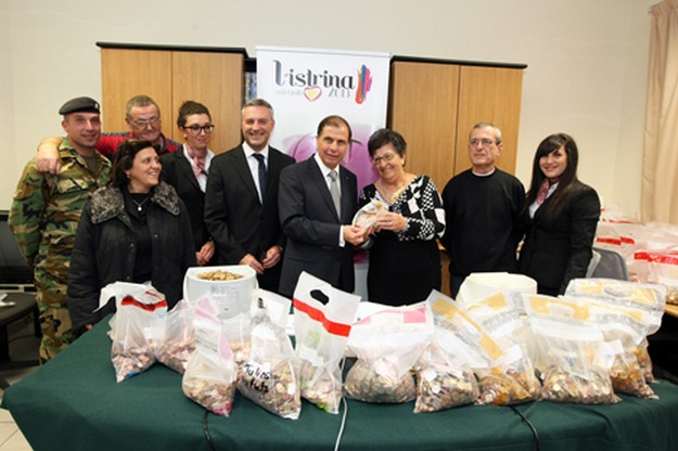 President Abela visits L-Istrina Piggy Bank coin counting process