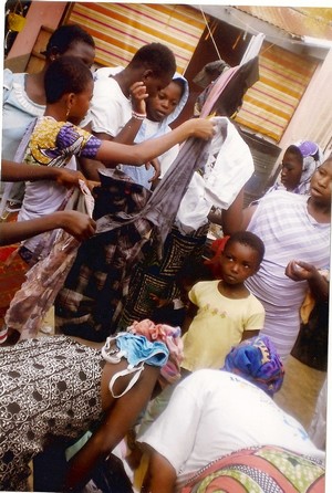 Tons of clothes & items collected by the OMVG distributed in Ghana