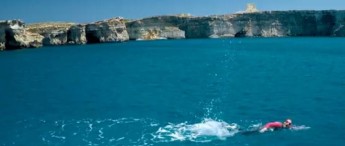 Michelle Muscat completes her swim for charity across the Gozo Channel