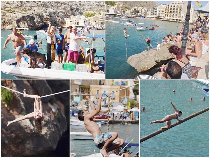 Slippery pole competition entertains the crowds in Xlendi Bay