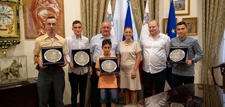 Young Gozitan cyclists celebrate their success with Gozo Minister