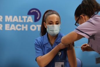 IDU staff nurse at Mater Dei is first to receive Covid-19 vaccine IDU staff nurse at Mater Dei is first to receive Covid-19 vaccine