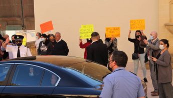 Gozitan residents greet Archbishop outside Court with protest over ”land grab”
