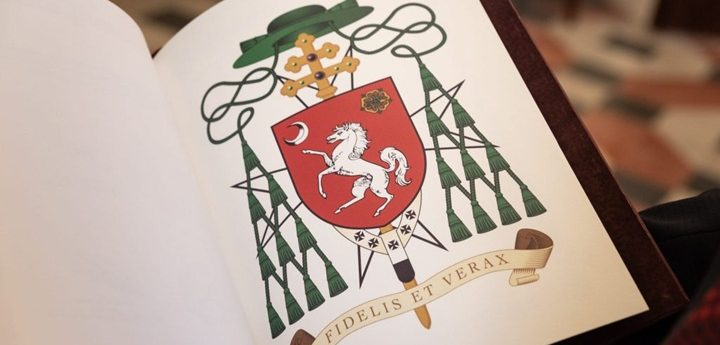 Archbishop Scicluna presented with registration of his coat of arms