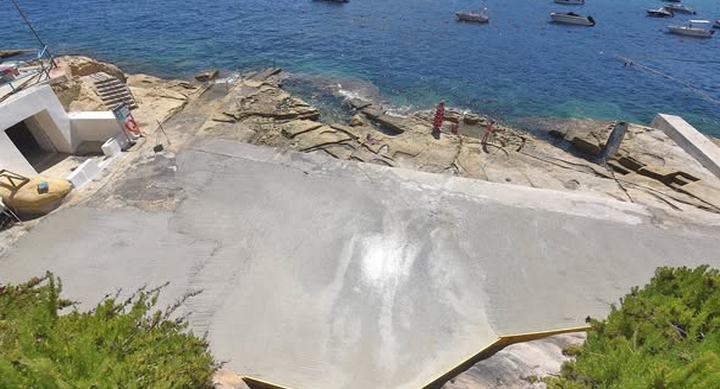 Cement poured illegally on coastal rocks at Marsalforn removed by PA